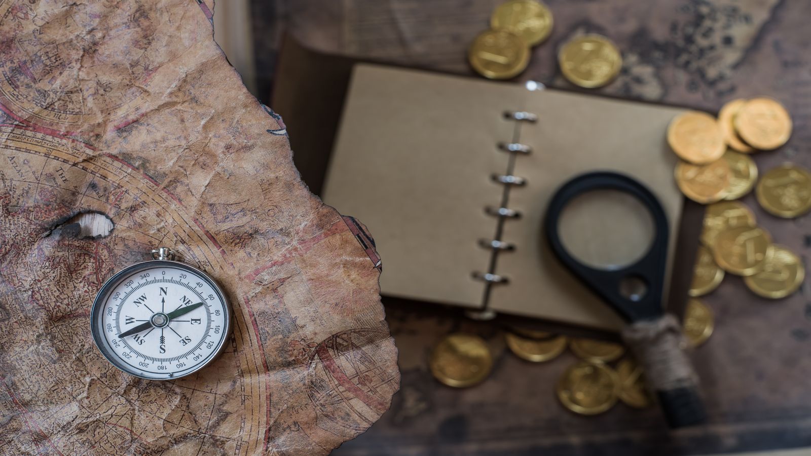 A vast open landscape at dawn with a single trail leading toward the horizon, blending the imagery of frontier exploration with the glow of digital networks