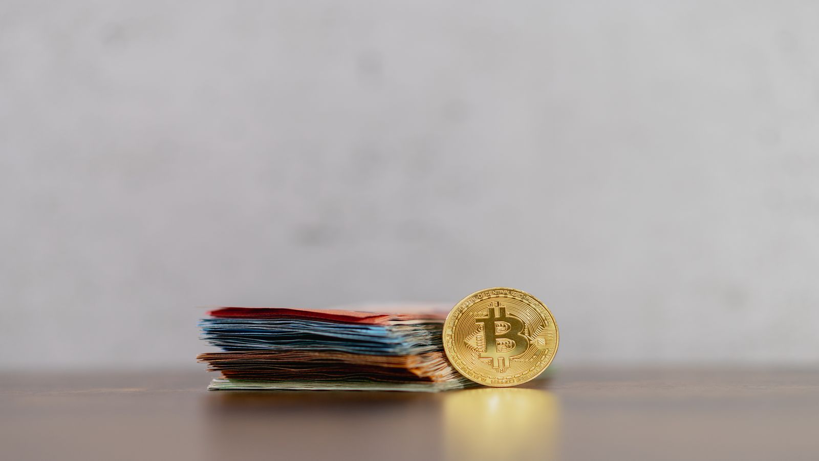 A split-frame illustration showing short-term price volatility on one side and long-term purchasing power erosion on the other, representing different dimensions of financial risk