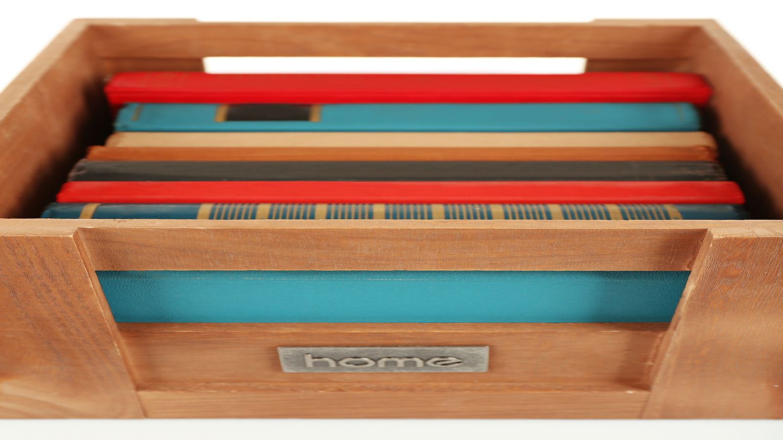 A well-organized studio desk with labeled folders, a reading lamp, notebooks, and a quiet sense of accumulated work